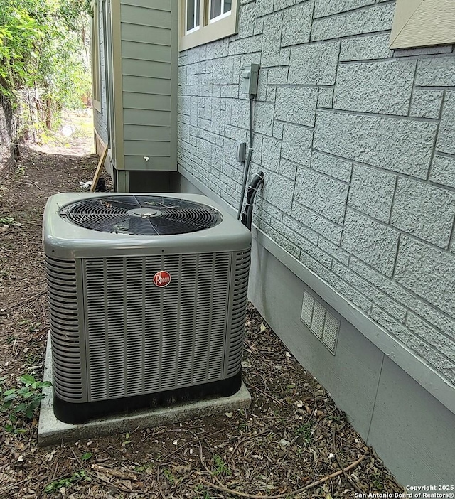 exterior details with central air condition unit