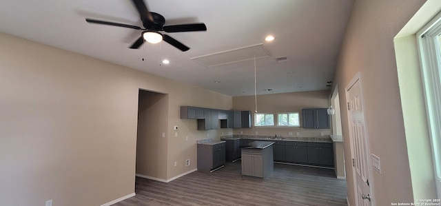 kitchen featuring ceiling fan, baseboards, dark wood-style flooring, gray cabinetry, and visible vents
