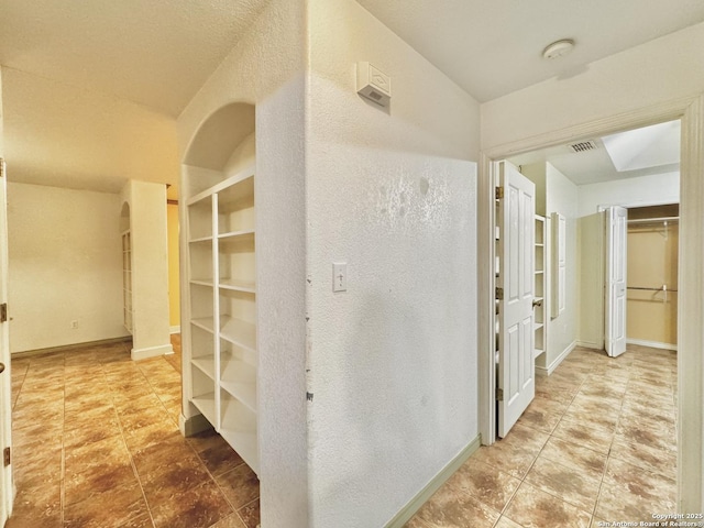 36 Leona Hts, Uvalde, TX 78801 - corridor featuring tile patterned floors