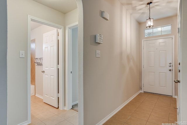 342 Perch Horizon, San Antonio, TX 78253 - foyer entrance with arched walkways, baseboards, and light tile patterned floors