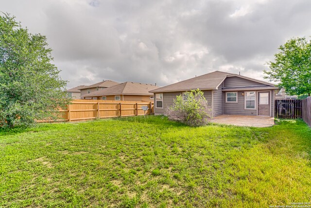 342 Perch Horizon, San Antonio, TX 78253 - rear view of house with a yard, a fenced backyard, and a patio