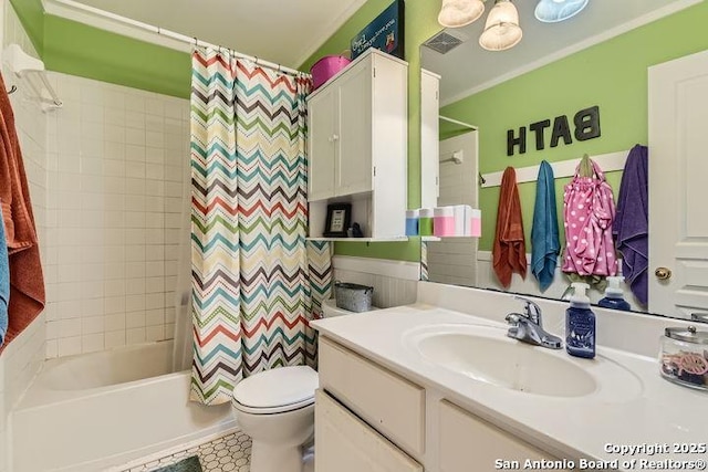 full bathroom with vanity, ornamental molding, shower / bathtub combination with curtain, and toilet