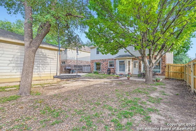 view of yard featuring a fenced backyard and a patio
