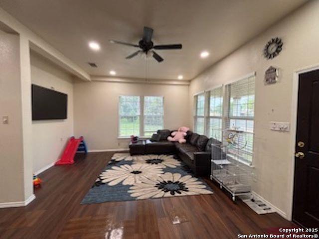 1121 N Oak, Pearsall, TX 78061 - living area with baseboards, wood finished floors, recessed lighting, and ceiling fan