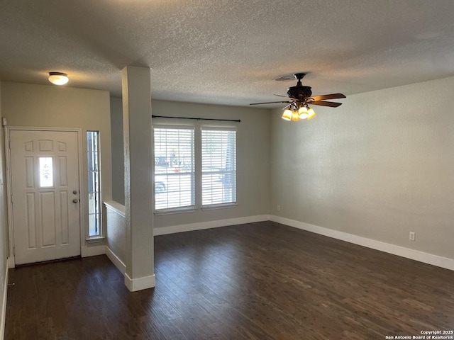 entryway featuring baseboards, a textured ceiling, ceiling fan, and dark wood-style flooring