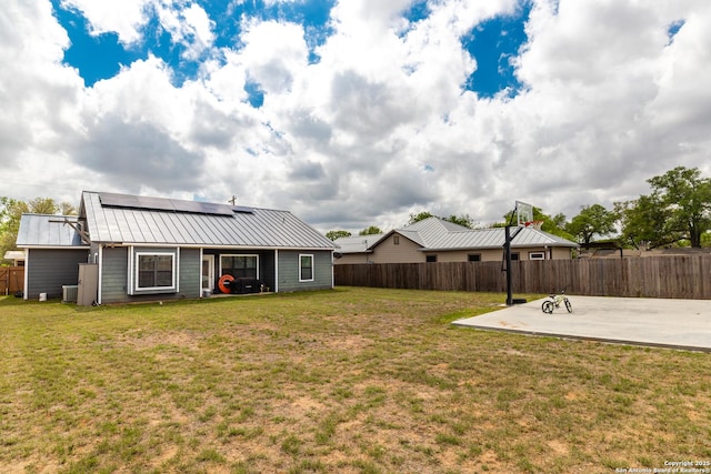 view of yard with a fenced backyard and a patio
