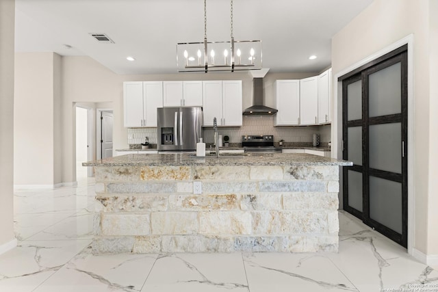 18262 Maureen Path, Lytle, TX 78052 - kitchen with stainless steel fridge with ice dispenser, wall chimney range hood, electric range oven, light marble finish floors, and decorative backsplash