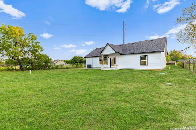 18262 Maureen Path, Lytle, TX 78052 - rear view of property with roof with shingles and a patio