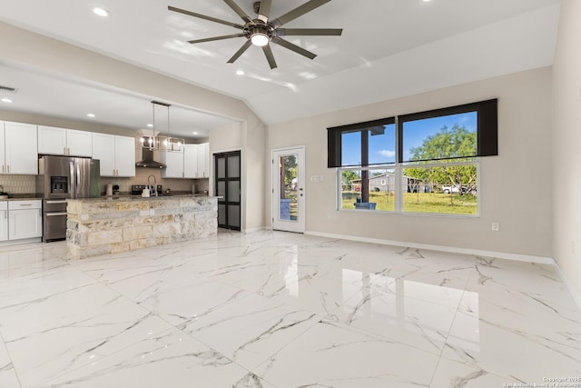 18262 Maureen Path, Lytle, TX 78052 - unfurnished living room featuring ceiling fan, recessed lighting, vaulted ceiling, and light marble finish flooring