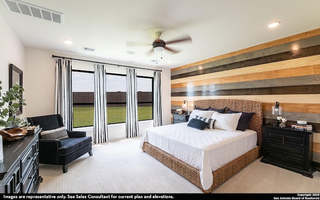 bedroom featuring recessed lighting, carpet floors, and visible vents