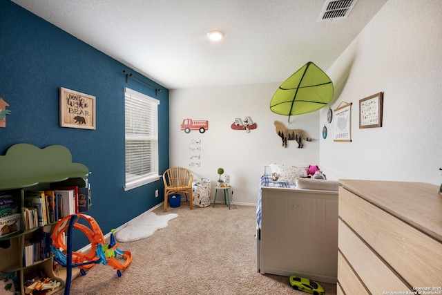bedroom with baseboards, visible vents, and carpet floors
