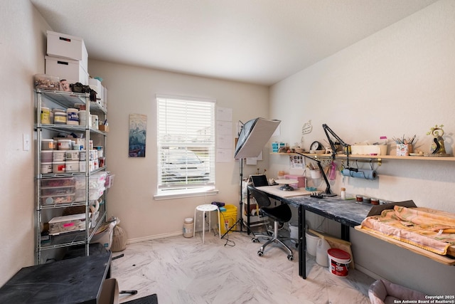 office space with baseboards