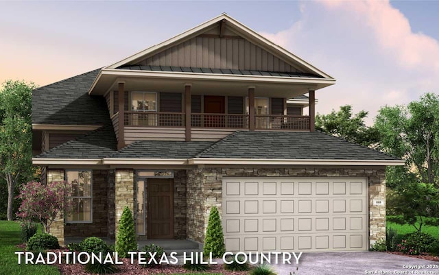 craftsman-style home featuring a balcony, board and batten siding, driveway, stone siding, and a garage