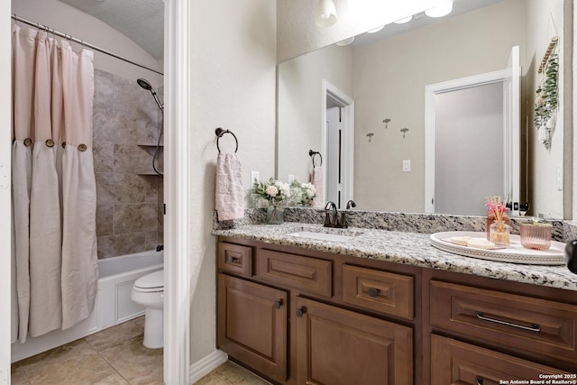 bathroom with toilet, double vanity, shower / bath combination with curtain, and tile patterned floors