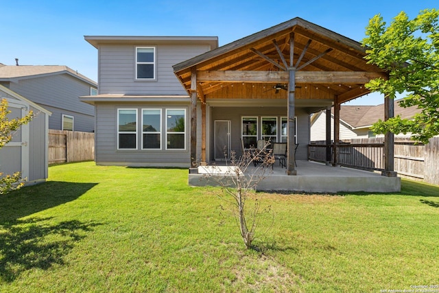 6772 Concho, Schertz, TX 78108 - rear view of house featuring a lawn, a fenced backyard, a ceiling fan, and a patio