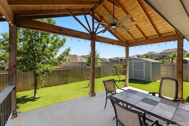 6772 Concho, Schertz, TX 78108 - view of patio / terrace with a storage shed, a residential view, a fenced backyard, a gazebo, and ceiling fan