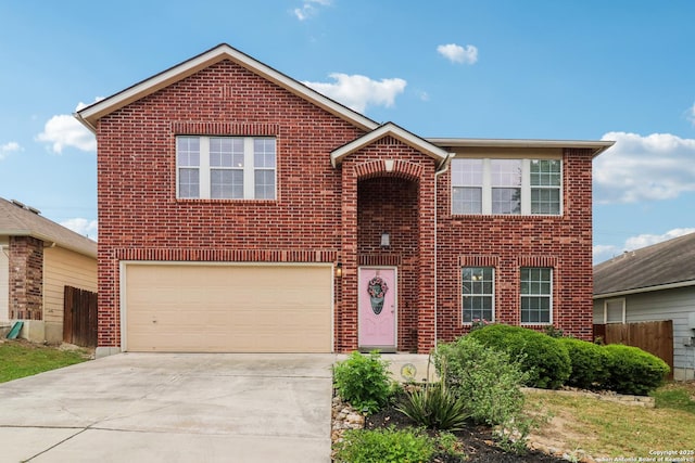 traditional-style home featuring brick siding, an attached garage, fence, and driveway