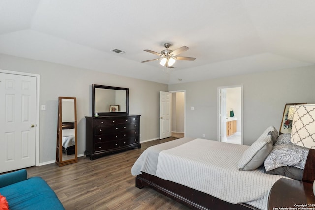bedroom with wood finished floors, visible vents, a ceiling fan, and baseboards