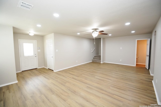 interior space with recessed lighting, stairway, visible vents, and light wood-style flooring