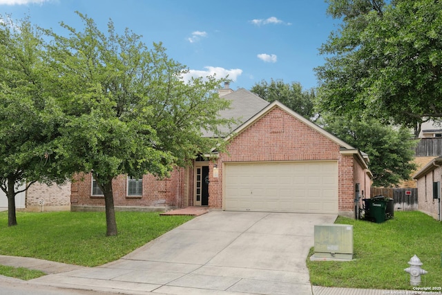 ranch-style house featuring brick siding, an attached garage, driveway, and a front lawn