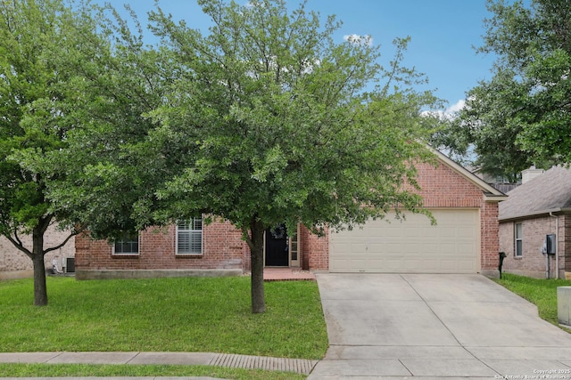 obstructed view of property with concrete driveway, brick siding, and a garage