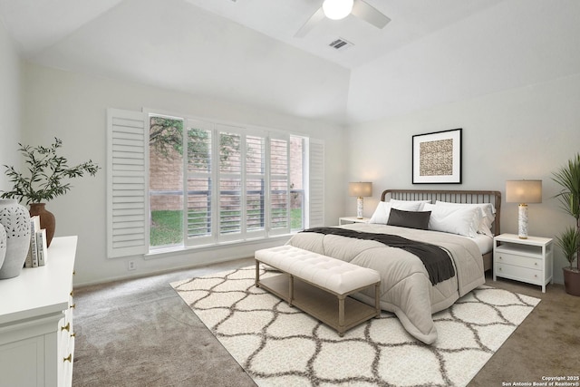 bedroom featuring carpet floors, ceiling fan, lofted ceiling, and visible vents