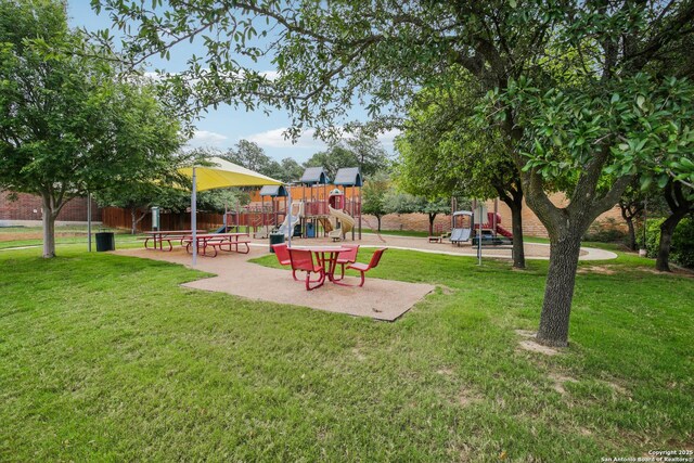 22010 Dolomite, San Antonio, TX 78259 - view of home's community with fence, a yard, and playground community