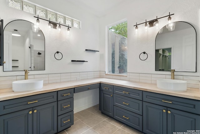 full bath with walk in shower, tile patterned flooring, and backsplash