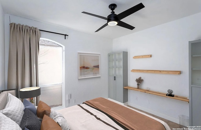 bedroom featuring ceiling fan