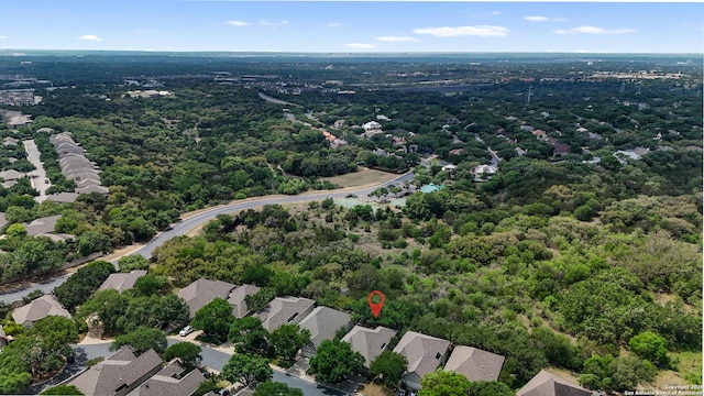 bird's eye view featuring a residential view and a view of trees