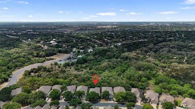 aerial view with a forest view and a residential view