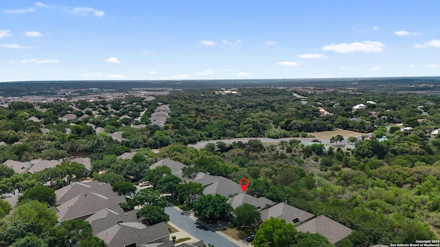 bird's eye view with a residential view and a forest view