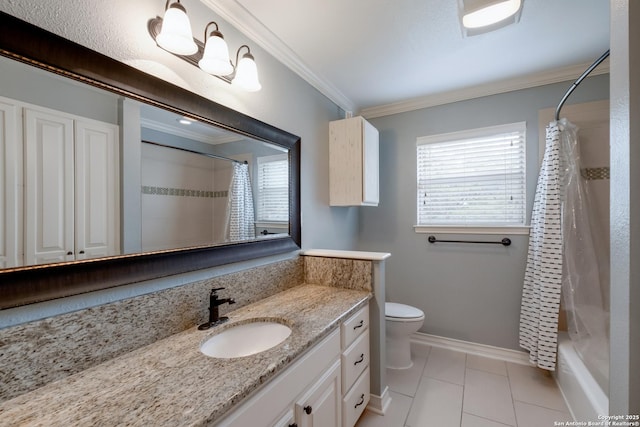 bathroom featuring tile patterned floors, vanity, baseboards, toilet, and ornamental molding