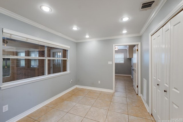 unfurnished room featuring light tile patterned flooring, crown molding, visible vents, and recessed lighting