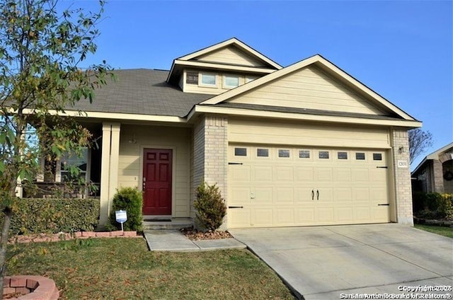 12031 Mill Love, San Antonio, TX 78254 - view of front of house featuring brick siding, a garage, and concrete driveway