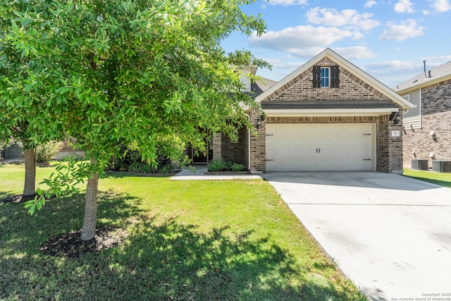 view of front of property featuring central AC, a front lawn, driveway, a garage, and brick siding