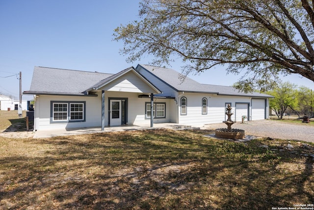 view of front facade with an attached garage and driveway