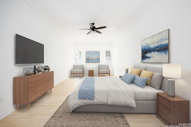 bedroom with a ceiling fan, light wood-style floors, and ornamental molding