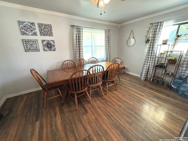 dining area with crown molding, baseboards, ceiling fan, and wood finished floors