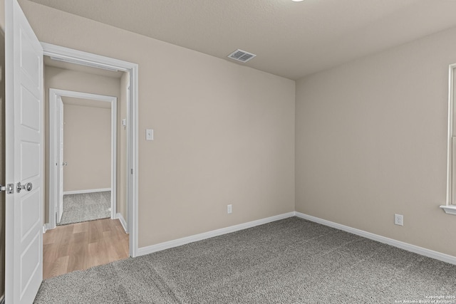 4265 Carlotta Dr, New Braunfels, TX 78130 - spare room featuring light carpet and baseboards