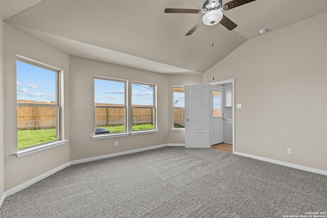 4265 Carlotta Dr, New Braunfels, TX 78130 - unfurnished room with carpet flooring, vaulted ceiling, baseboards, ceiling fan, and a smoke detector