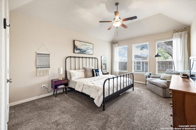 bedroom with lofted ceiling, heating unit, baseboards, and carpet floors