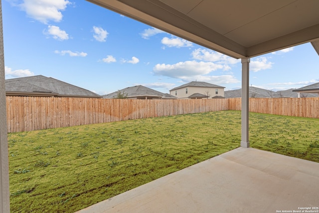 view of yard featuring a fenced backyard and a patio area