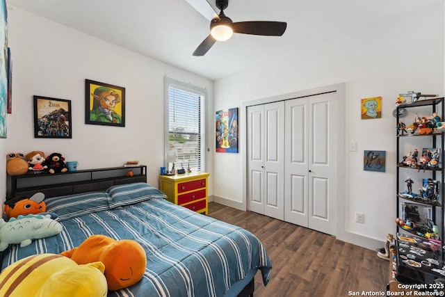 bedroom with baseboards, wood finished floors, a closet, and ceiling fan