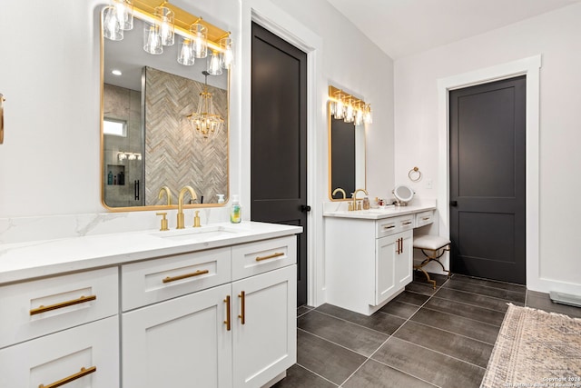 full bathroom with two vanities, a sink, and tiled shower
