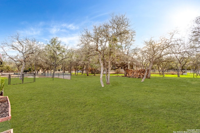 view of yard featuring fence