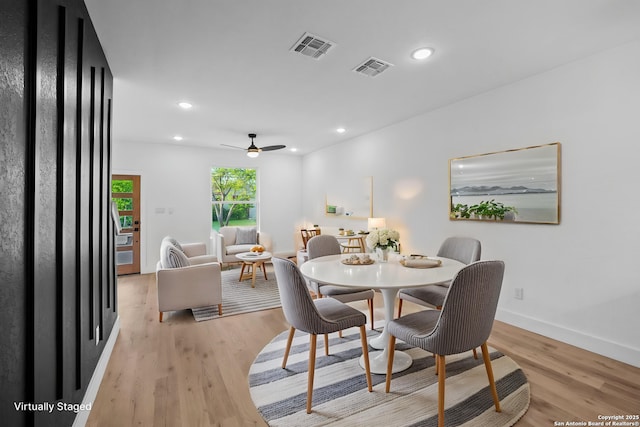 dining area with baseboards, visible vents, recessed lighting, and light wood-style floors
