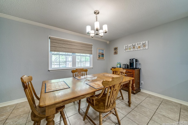 dining room with baseboards, a notable chandelier, crown molding, and light tile patterned floors