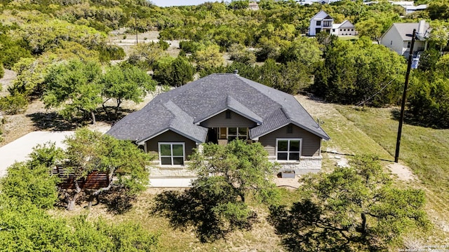 bird's eye view featuring a forest view