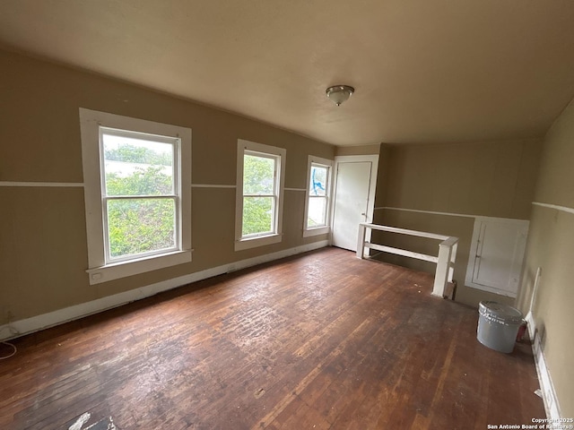 unfurnished living room with dark wood-style floors